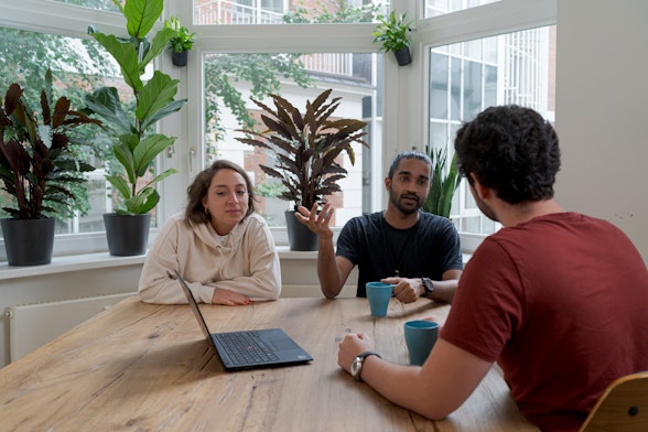 The payroll team in a meeting